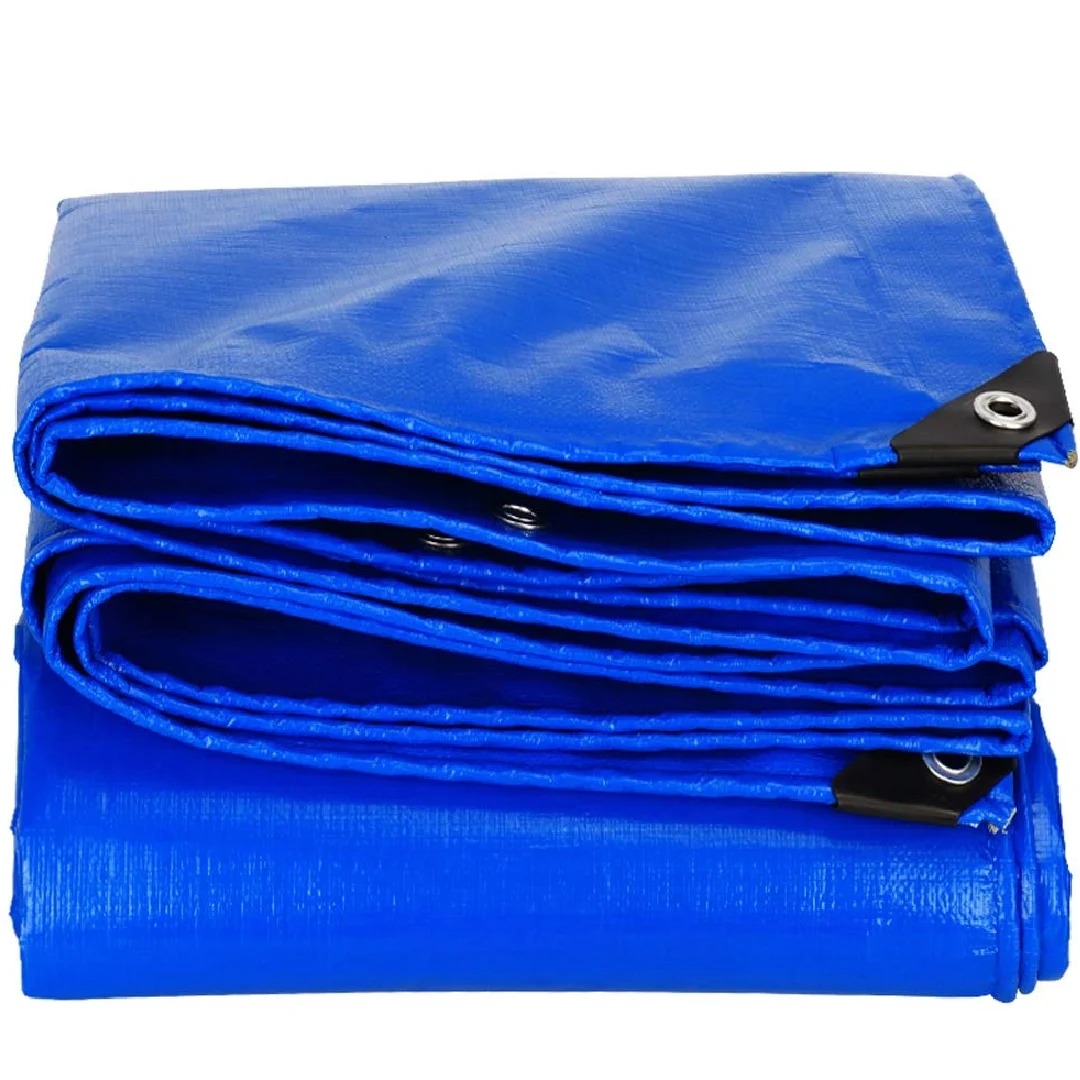 Workers handling industrial tarpaulin at JUMBOTARPS